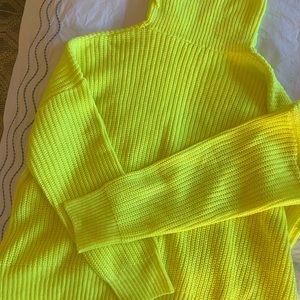 Yellow turtleneck sweater